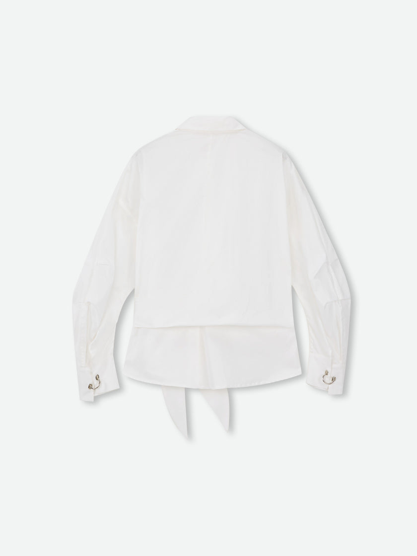 Camisa con nudo esculpido