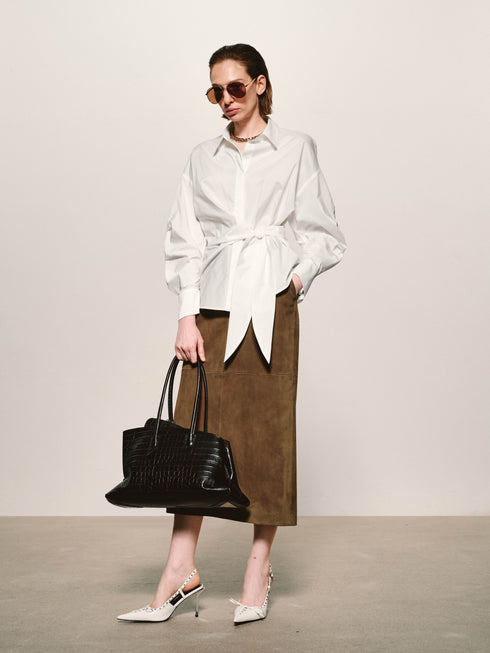 Camisa con nudo esculpido