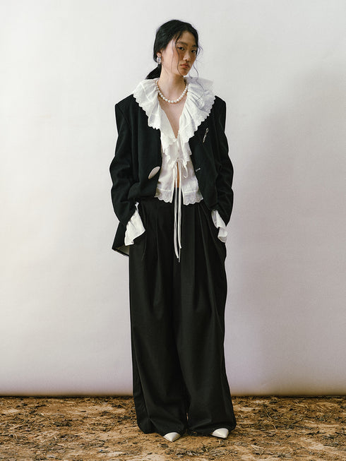 Blusa con fruncido y volantes color marfil