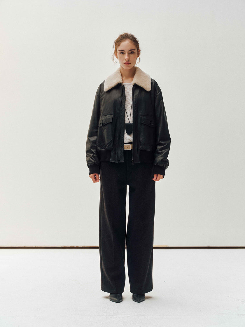 Veste en cuir avec col en peau lainée