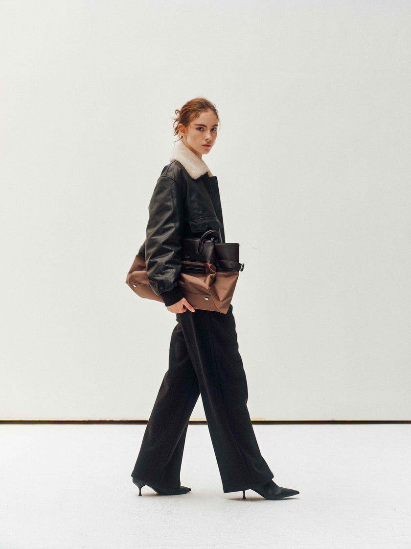 Veste en cuir avec col en peau lainée