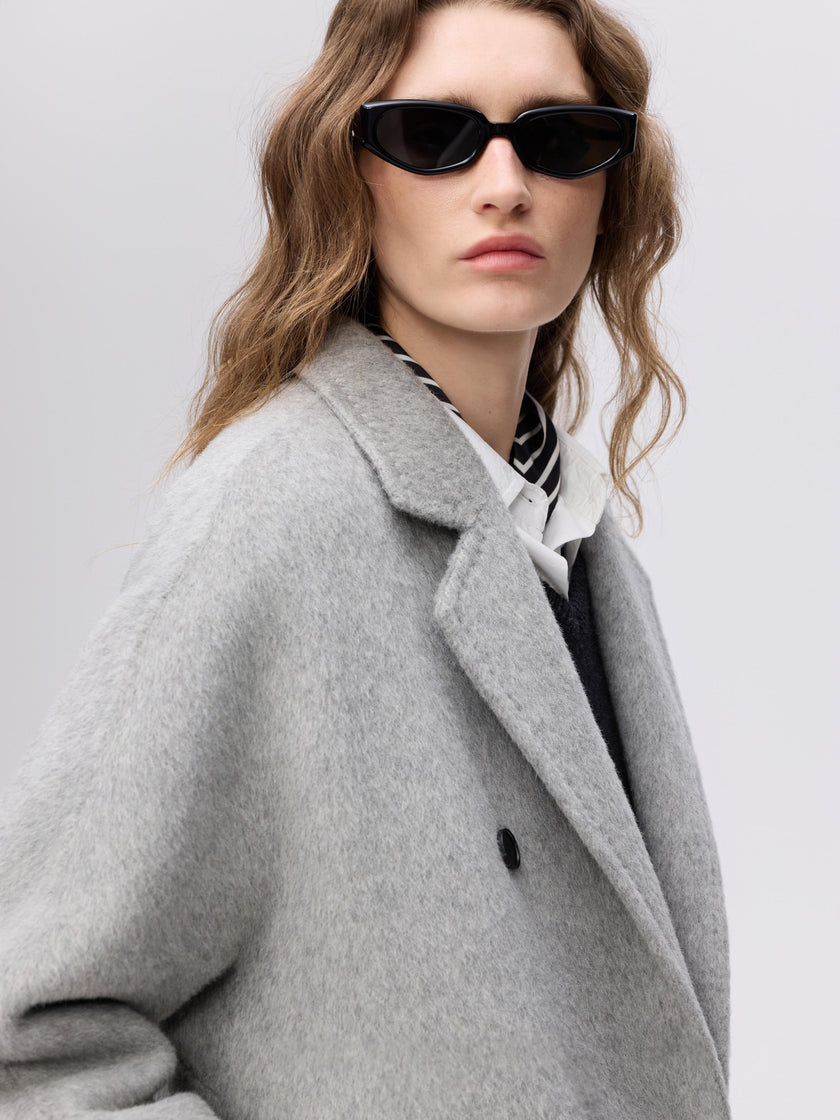 Manteau en laine camel à double boutonnage