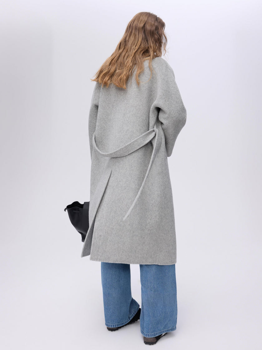 Manteau en laine camel à double boutonnage