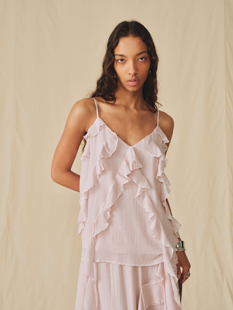 Top camisero con vuelo