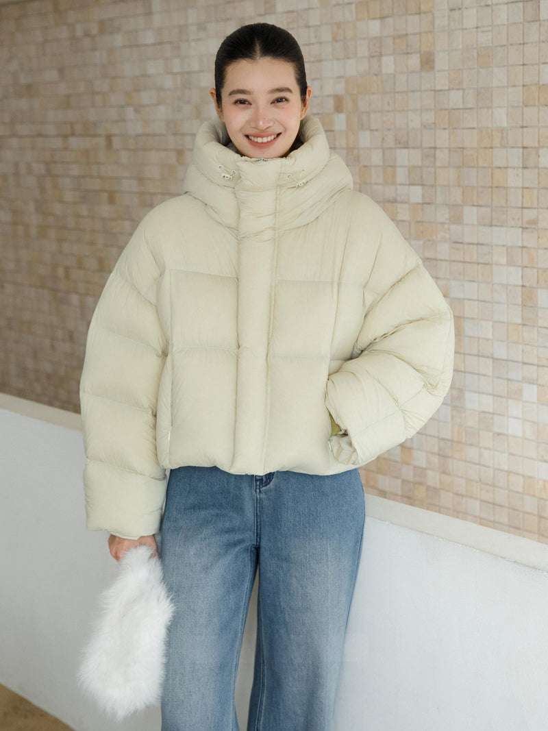 Veste courte matelassée à capuche